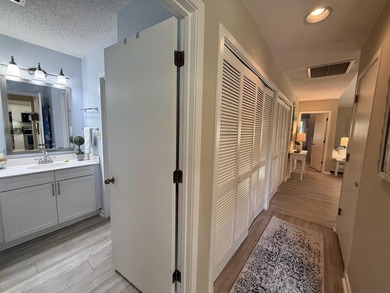 Updated and attractive second-floor end-unit villa featuring two - photo 38
