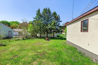 Tucked into a quiet West St. Paul neighborhood, this charming - photo 49
