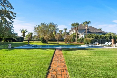 Tucked behind the gates of Bay Point, a grand Southern, Colonial - photo 3