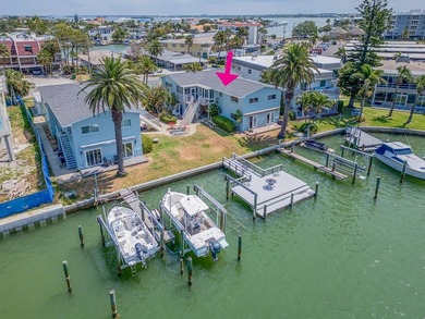 RARE WATERFRONT FIND WITH BOAT SLIP, AND GARAGE Discover the - photo 1