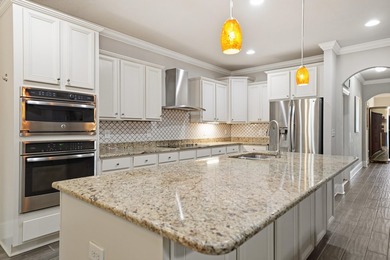 This beautifully upgraded 5-bedroom, 3 bath home is one of the - photo 8