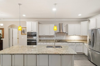 This beautifully upgraded 5-bedroom, 3 bath home is one of the - photo 10