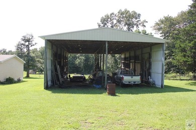 Home is on large lot has plenty of covered parking, pull through - photo 3