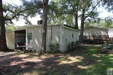 Home is on large lot has plenty of covered parking, pull through - photo 9