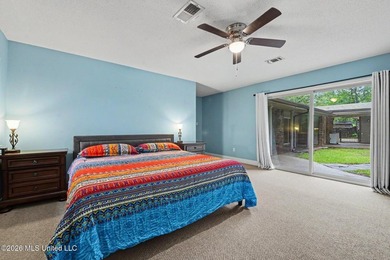 Situated on a quiet cul-de-sac in the heart of Diamondhead, this - photo 11