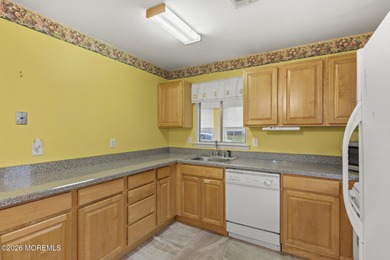 Approach this home via a low-maintenance composite deck with a