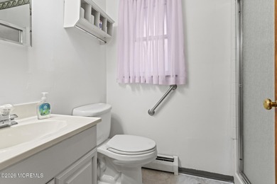 Approach this home via a low-maintenance composite deck with a