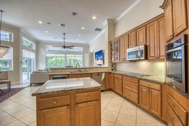 A private backyard oasis with a screened pool, outdoor kitchen - photo 15