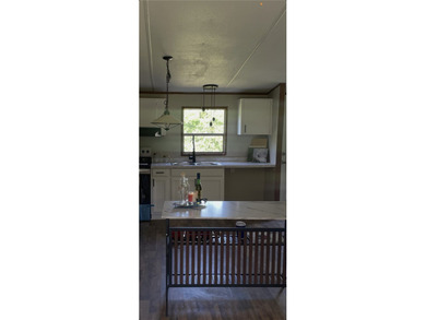 Discover easy lake-country living in this charming 3-bedroom - photo 16
