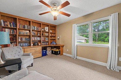 Situated on a quiet cul-de-sac in the heart of Diamondhead, this - photo 18