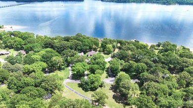 Set behind the gates of Brook Harbor on the renowned shores of - photo 9