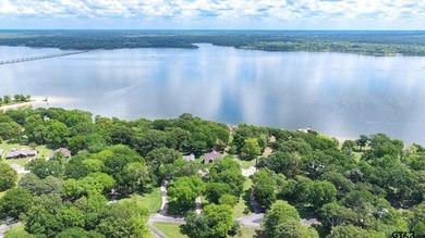 Set behind the gates of Brook Harbor on the renowned shores of - photo 10