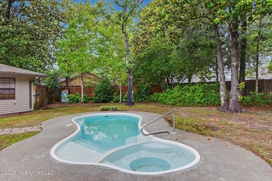 Situated on a quiet cul-de-sac in the heart of Diamondhead, this - photo 24