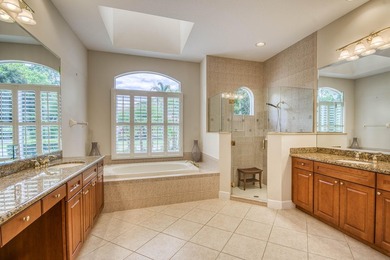 A private backyard oasis with a screened pool, outdoor kitchen - photo 24