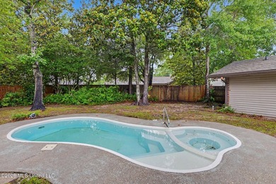 Situated on a quiet cul-de-sac in the heart of Diamondhead, this - photo 25