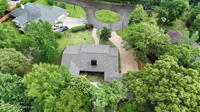 Situated on a quiet cul-de-sac in the heart of Diamondhead, this - photo 29