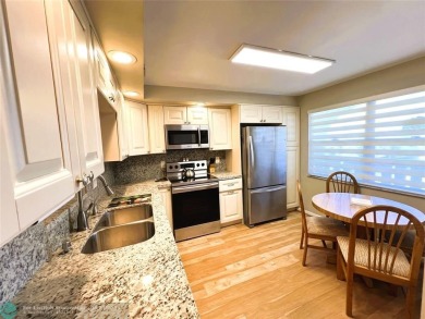 Lake Condo For Sale in Coconut Creek, Florida