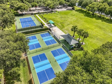 A private backyard oasis with a screened pool, outdoor kitchen - photo 47