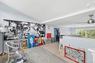 Light-filled and inviting, this upper-level residence at East - photo 12