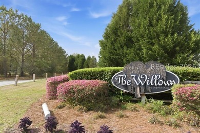 Welcome to this charming 4-bedroom, 2-bath home located in the - photo 2