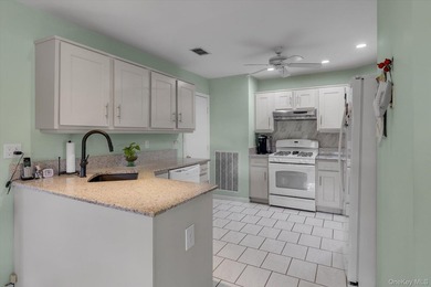 Welcome to 35 Lakebridge Drive South, a beautifully maintained - photo 7