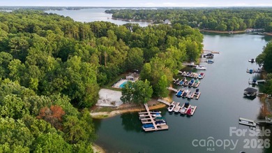 This beautifully maintained home with a deeded boat slip with a - photo 5