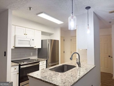 Welcome to this beautiful 3rd-floor condo in the prestigious 55+