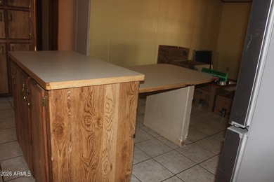 What a find...stucco 4BR/2BA home on 4 acres...covered front