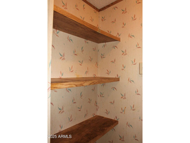 What a find...stucco 4BR/2BA home on 4 acres...covered front