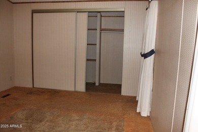 What a find...stucco 4BR/2BA home on 4 acres...covered front