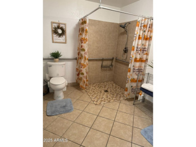 Gorgeous upgraded single-level home with 6 bedrooms, including 2