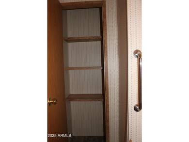 What a find...stucco 4BR/2BA home on 4 acres...covered front