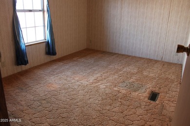 What a find...stucco 4BR/2BA home on 4 acres...covered front