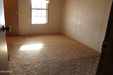 What a find...stucco 4BR/2BA home on 4 acres...covered front