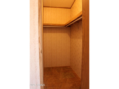 What a find...stucco 4BR/2BA home on 4 acres...covered front