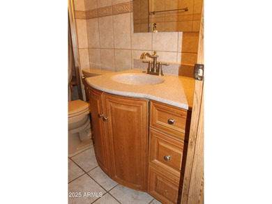 What a find...stucco 4BR/2BA home on 4 acres...covered front