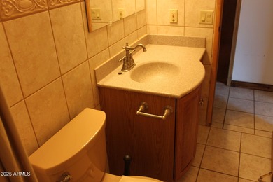 What a find...stucco 4BR/2BA home on 4 acres...covered front