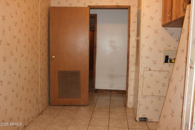 What a find...stucco 4BR/2BA home on 4 acres...covered front