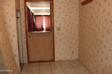 What a find...stucco 4BR/2BA home on 4 acres...covered front