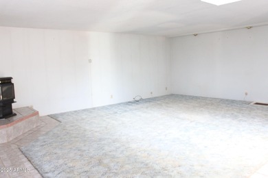 What a find...stucco 4BR/2BA home on 4 acres...covered front