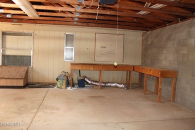 What a find...stucco 4BR/2BA home on 4 acres...covered front