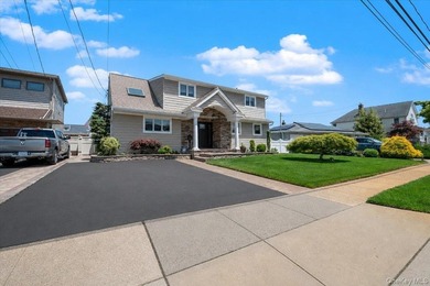 Nestled in the heart of desirable Massapequa and just minutes - photo 2