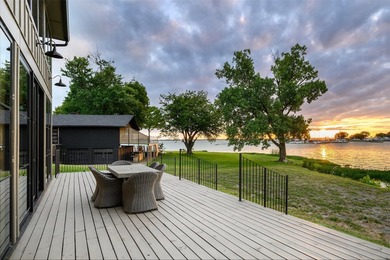 Experience elevated waterfront living at 313 Scenic Drive, where - photo 2