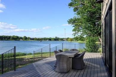 Experience elevated waterfront living at 313 Scenic Drive, where - photo 3