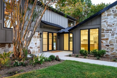 Experience elevated waterfront living at 313 Scenic Drive, where - photo 4