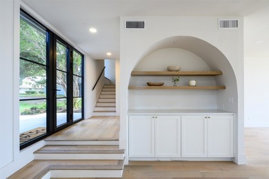 Experience elevated waterfront living at 313 Scenic Drive, where - photo 5