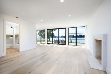 Experience elevated waterfront living at 313 Scenic Drive, where - photo 6