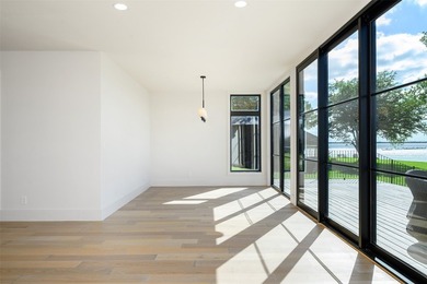 Experience elevated waterfront living at 313 Scenic Drive, where - photo 8