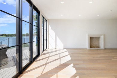 Experience elevated waterfront living at 313 Scenic Drive, where - photo 9