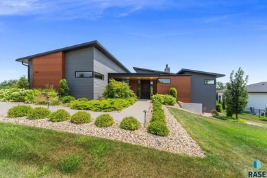 Welcome to this stunning modern riverfront retreat, where luxury
